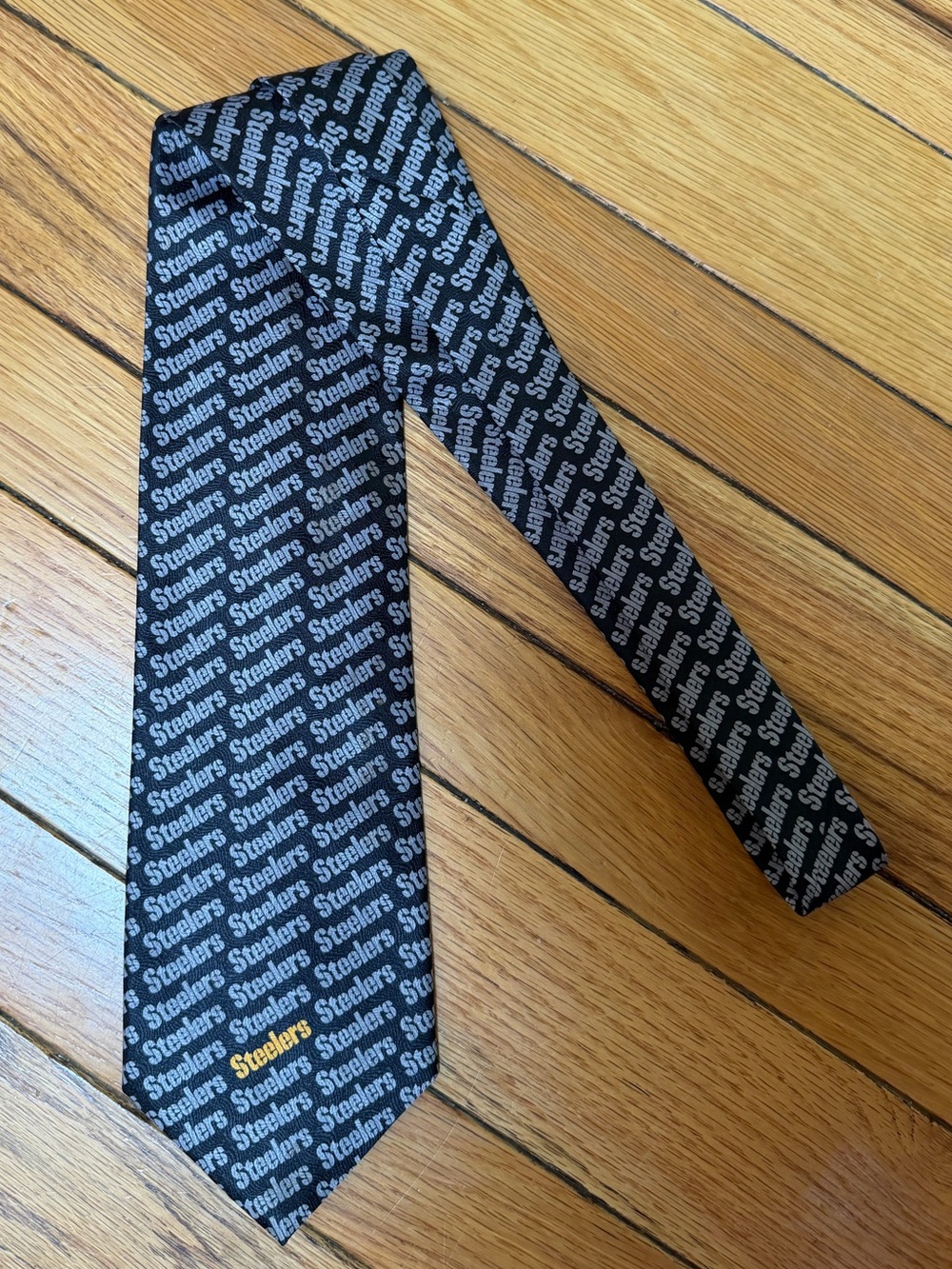 NFL Black Repeating 'Steelers' Logo Tie with Yellow Accent